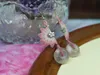 Brincos dangledings de cera artesanal de cera de cerejeira rosa Butro