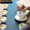 Ensembles de voies de thé 6 personnes ensemble de thé gaiwan fuite basse tasse osse de porcelaine de porcelaine en verre céramique table yerba mate cérémonie fleurs peintes à la main