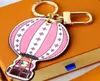 Limited Edition Key Wallet Luxury Brand Hot Air Balloon Graffiti Letter Designer Men and Women Car Keychain Unisex Bag Totes Crossbody Pendant Gift1131785