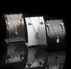 10Pcs Popular Jewelry Display Stand Black White Clear Mini Size Plastic Neck Bust Pendant Necklace Stand Earring Holder Set Stand 4447062