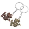 Geschenkverpackung 2pcs Schlüsselbund Anhänger Dragon Charms Schlüsselringschlüsselring Anhänger für Taschen