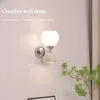 Vägg lampa sovrum sovrum kräm vind upp och ner lysande ljus modern minimalistisk vardagsrum gång