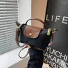 Hobo högkvalitativa skalväskor för kvinnor 2024 Brand axelväska lyxväskor och handväskor designer crossbody söt liten satchel