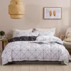 A cama conjunta a fronha de tampa de colcha com protetor de padrão geométrico xadrez triangular