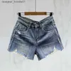 Kvinnors shorts tidigt på våren kvinnors shorts modebrev broderi nödställda tvättade denim shorts designer byxor kvinnor blå a-line heta byxor c240413