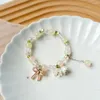 Charm Armbänder weiße Blume Perlen Armband Gradient Bug exquisites Handketten frische Hanfu -Accessoires Glücksgeschenk