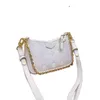 Easy Pouch Designer Bag Axelväskor Luxury Bag Single Chain Plated Gold Präglad blomma Underarm Bag For Ladies Solid Letters Vanliga läder Handväska M81066 TE035 C4