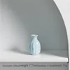 Vases Longli Porcelain Ceramic Bottes créatives maison Mini Vase Ornement Decoration Small Hydroponic Wave