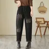 Jeans pour femmes yzjnh 2024 Automne / hiver imprimé léopard lâche et pantalon de pantalon harem élastique à taille haute et décontractée