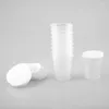 Bouteilles de rangement 10pcs 30 ml de mesure de mesure en plastique avec couvercle blanc capteur transparent transparent support de liquide gradué transparent