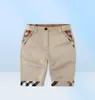 Gentleman Style Summer Boys Plaits Shorts enfants bouton de pantalon intermédiaire décontracté vêtements