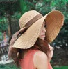 2020 Nouveaux chapeaux d'été à bord large pour les femmes Vacances de vacances Chapeau de plage Ribbon Bow Visor Soleil Paille Panama femme039s Sun Caps T23828482