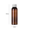 保管ボトル50pcs 60ml空の空の透明な化粧品プラスチックボトルシルバーアルミニウムスクリューキャップ2オンスの液体容器
