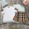 T-shirt pour femmes Spring Fashion Girls Two Piece Set Plaid Preeted Jirt Sploded Casual Academy Style