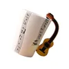 Tasses de style guitare tasses de guitare élégant et durable en céramique tasse de thé note de musique note de note de lait saxophones jaunes 10x7,5 cm