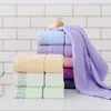 Face en coton de serviette 34x75 cm lavage ménage épaissis épaissis super absorbant Famille de la famille des cadeaux quotidiens spéciaux