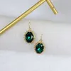 Fenggui Talent Designer Inlaid Green Oval Transparent Fashion Natural Durian Ear Hook