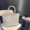 Designer Beach Tote Bag VLT Raffias Handväskor Luxurys väver Travel Handväska axel Duffle Bag Rivet Crossbody Womens Mens Clutch Shop Straw Bags 240415