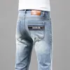 Jeans masculin printemps d'été mince masculin slim slim américain calicon marque haut de gamme petit pantalon droit Q9576-00