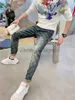 Designer Jeans for Mens Autumn/Winter New Jeans Trendy Brand Gedrukt Gedrukt kleine rechte beenbroeken voor jeugdmodebroek