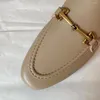 Slippers MD 2024 Chaussures de mules en cuir authentiques pour femmes boucles de mode Spring Summer Designer Flat Mood Femme décontractée