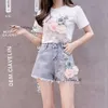 Designer Högkvalitativ lyxmode 2024 Summer Women 2 Piece Set Embroidery 3D Flower T-Shirt Denim Shorts Set Vintage Shorts LouiseviutionBag 241