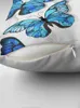 Design d'oreiller avec des papillons bleus