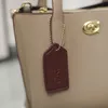 Frauen Designer -Tasche Fashion Lady Handtaschen Luxus Metall -Logo -Umhängetaschen vielseitiger tragbarer Kreuzkörper großer Kapazität Einkaufsbeutel