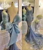 2020 Formal Celebrity Evening Dresses With Big Bow Sheer Long Sleeves Sky Blue Lace Bead Fishtail Train Prom Party Gowns Modest Zu9152423