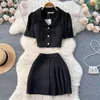 Arbetsklänningar Kvinnor Summer Fashion Style Two Piece Set Spicy Girl Turn-Down Collar Short Sleeved Top Pleated Wrapped Hip Skirt Sets