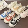 Scarpe casual Qualità Donne di colore solido Donne spesse tela di tela larga ghirlande da ginnastica flat sneakers allacciato studenti tennis 35-40