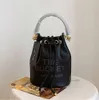 2024 Designer The Borse Bag Sour Shool Women Borse Tote Fashion Famous Crow Wholesale Exmbossing Cultaling