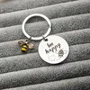 Keychains Bee fofo Bumble Bumble Brikets redondo decorações de charme de aço inoxidável humor engraçado presente para a família de amigos