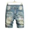 Męskie graffiti Zgrane letnie mody krótkie dżinsy swobodne szczupły hole w stylu retro dżinsowe szorty męskie ubrania marki 240403