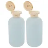 Vloeibare zeepdispenser 2 pc's herverpakte lotion fles reisflessen plastic shampoo met deksels lege distribeerbaar