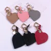 Dekorativa figurer Fashion Leather Heart Keychain Män och kvinnor Par små varor Personliga kreativa present Metal Väskor Pendant Ornament