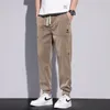 Pantalon masculin Embroderie élégante décontractée 2024 Summer mince lâche élastique Vêtements à crampons coréens Pantalons de vitalité