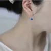 Boucles d'oreilles en pente