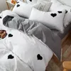 Set di biancheria da letto nuda per la pelle per la pelle che dorme lamupole a quattro pezzi foglio di copertura in cotone lavata semplice