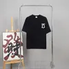 Summer Mens Designer T Shirt Man casual Camas sueltas Camas sueltas con letras Impresión de mangas cortas Vender a hombres de lujo Edición suelta Tamisa Tamaño M-XXXL A15