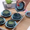 Ensembles de thérapie en céramique tasse de thé en céramique ensemble de thé Pagode cadeau personnel à la maison Modèle de caractéristique chinois Visiteurs de bureau