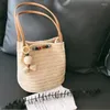 Drawstring Women's Wood Pärlor Decoration Leisure Straw Bag Axel Woven Bucket Wild Tassels Hair Ball Beach Handväska