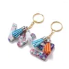 Keychains 65pcs / Set Keynchain avec des anneaux clés Pin d'œil Jump Pin de la résine époxy color