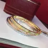 Bracciale oro Bracciale oro Braccia a doppia fila a doppia fila diamante Gioielli di lusso Larghezza 5 mm Inlay Hidden Processo ad alta dissolvenza Braccialetti resistenti ad alta dissolvenza Designer per donne