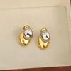 Boucles d'oreilles STAD Freetry exquise Metal à deux tons pour les femmes Personnalité de la mode