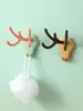 Hooks Antlers Hook Home Creative wielofunkcyjny silny obciążenie stałą klamrę za drzwiami bez paznokci i śledzenia lepkiego