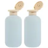 Dispensateur de savon liquide 2 pcs de douche de douche bouteille de bouteille de lotion avec couvercles petit contenant en plastique shampooing vide voyage