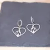 Boucles d'oreilles goujons Kinial Heart on Fire Pendentif en acier inoxydable de charme Love sacré Burning Laser