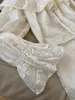 Casual jurken 2024 lente/zomer witte één schouderhemel Silk retro jacquard geborduurde hoorn mouwen taille wrap jurk vrouw mini rok