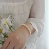 Bangel Französisch Retro Perlenarmband für Frauen elegante Muschel Perlen Bangies Bangies Bracelets Mädchen Hochzeit Bankett Kinder Geschenk